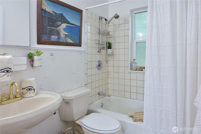 1917 NE 143rd St, Seattle, WA 98125 - full bathroom featuring tile walls, a sink, shower / bath combo with shower curtain, toilet, and tasteful backsplash