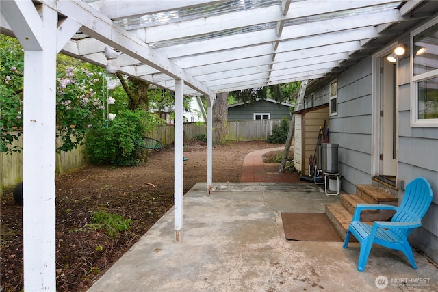 1917 NE 143rd St, Seattle, WA 98125 - view of patio / terrace featuring a fenced backyard, entry steps, and a pergola