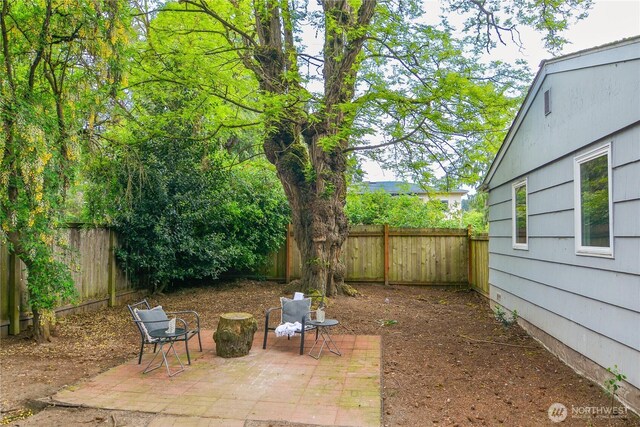 1917 NE 143rd St, Seattle, WA 98125 - fenced backyard with a patio
