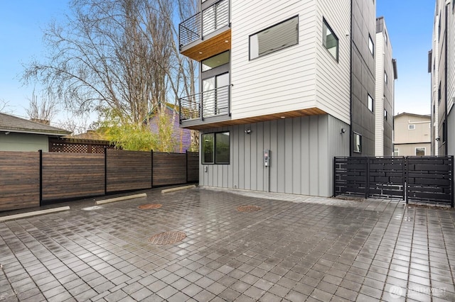 8333 14th Ave NW Unit A, Seattle, WA 98117 - view of patio / terrace featuring a balcony and fence