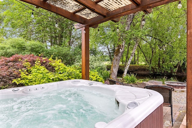 view of patio featuring a hot tub