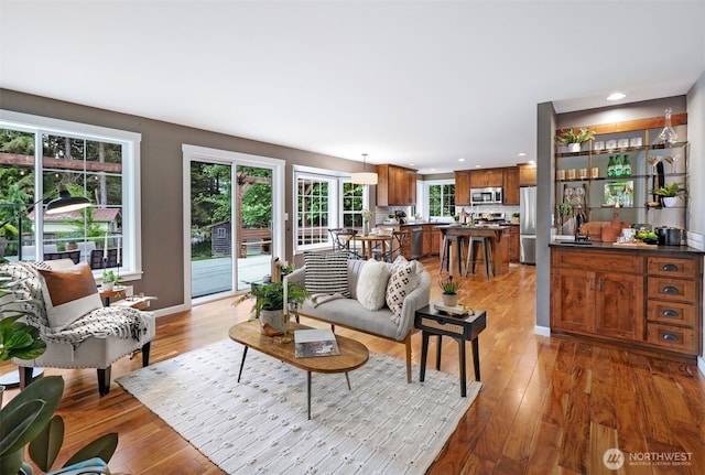 6423 138th Pl SE, Snohomish, WA 98296 - living room with hardwood / wood-style flooring and recessed lighting