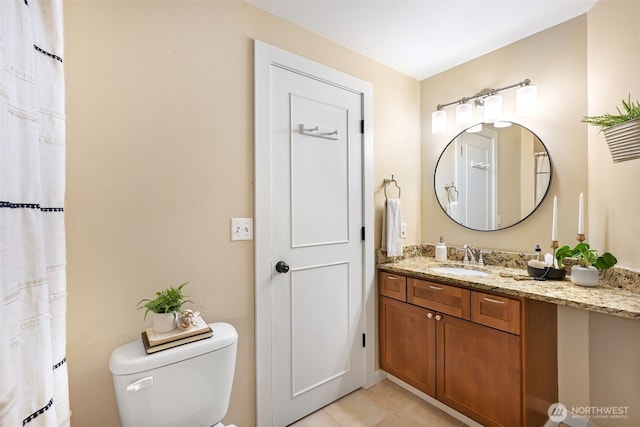 6423 138th Pl SE, Snohomish, WA 98296 - bathroom featuring toilet, vanity, and tile patterned floors