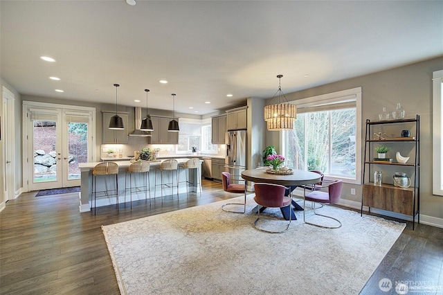 7223 NE 118th Ct, Kirkland, WA 98034 - dining area featuring recessed lighting, dark wood-type flooring, baseboards, a chandelier, and french doors