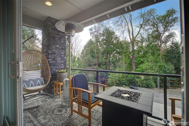 7223 NE 118th Ct, Kirkland, WA 98034 - balcony with an outdoor fire pit