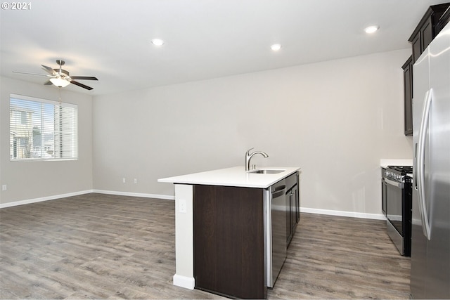 15326 NE 70th St, Vancouver, WA 98682 - kitchen with appliances with stainless steel finishes, a sink, ceiling fan, dark wood-style floors, and recessed lighting