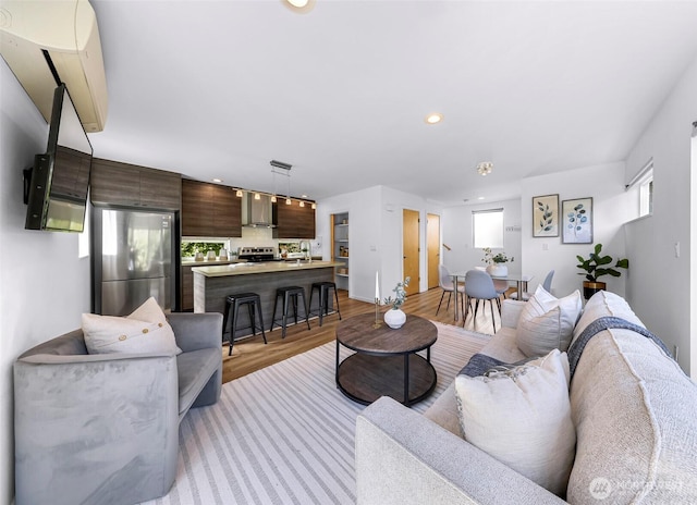 4757 Delridge Way SW, Seattle, WA 98106 - living room with light wood-style floors and recessed lighting