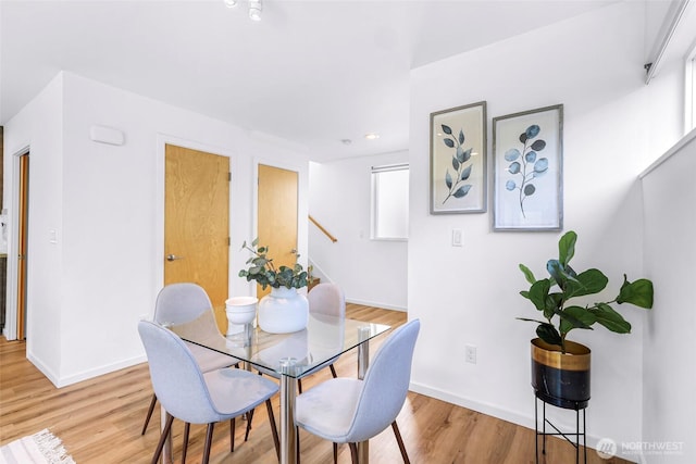 4757 Delridge Way SW, Seattle, WA 98106 - dining area with light wood-style flooring, stairway, baseboards, and recessed lighting