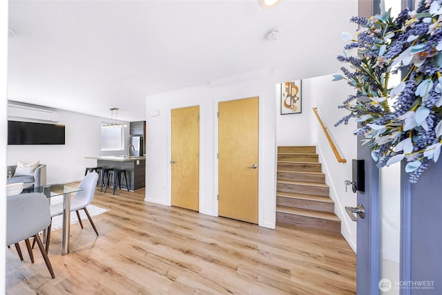 4757 Delridge Way SW, Seattle, WA 98106 - foyer featuring light wood finished floors and stairs