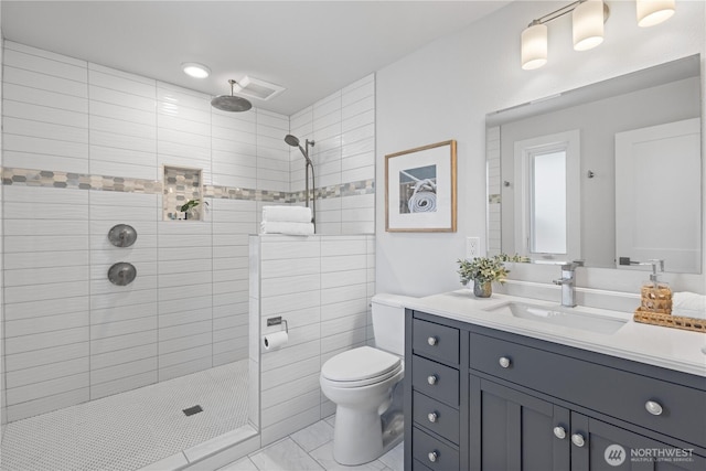 17905 NE 19th Pl, Bellevue, WA 98008 - full bathroom with vanity, a tile shower, toilet, and tile patterned floors