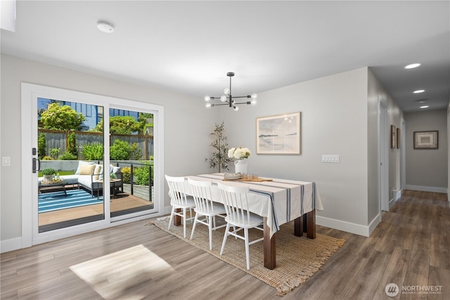 17905 NE 19th Pl, Bellevue, WA 98008 - dining area featuring a chandelier, baseboards, wood finished floors, and recessed lighting