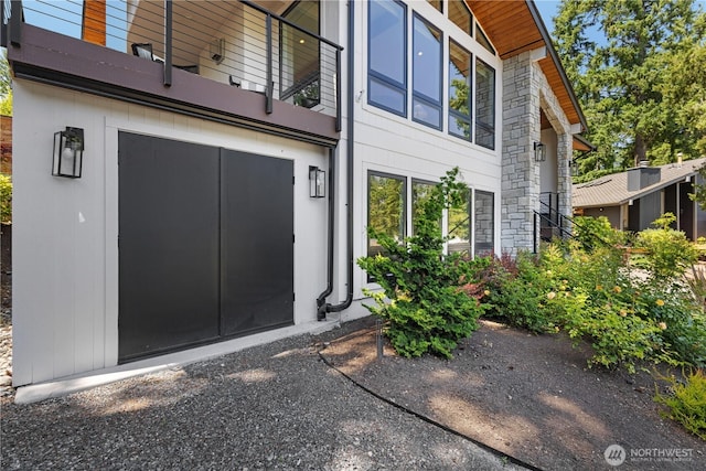 17905 NE 19th Pl, Bellevue, WA 98008 - view of side of home with a balcony