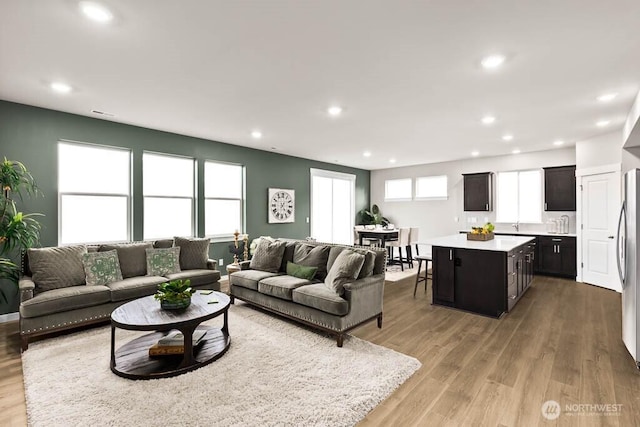 3937 23rd Ave NE Unit 100, Olympia, WA 98506 - living area with recessed lighting and light wood-style flooring