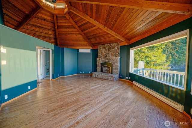 585 Raccoon Point Rd, Orcas Island, WA 98245 - unfurnished living room featuring wood ceiling, wood finished floors, beam ceiling, a baseboard heating unit, and baseboards