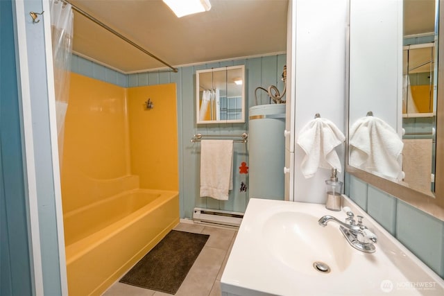 585 Raccoon Point Rd, Orcas Island, WA 98245 - full bathroom with gas water heater, a baseboard heating unit, tile patterned floors, shower / bath combo, and vanity