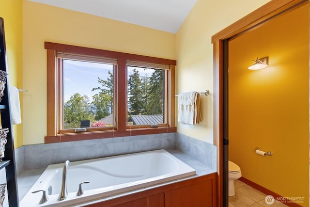1433 Madison St, Port Townsend, WA 98368 - bathroom featuring a bath, toilet, and tile patterned floors