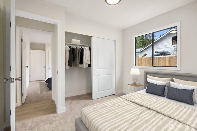 18771 Harris Ave NE, Suquamish, WA 98392 - bedroom with a closet, carpet, and baseboards