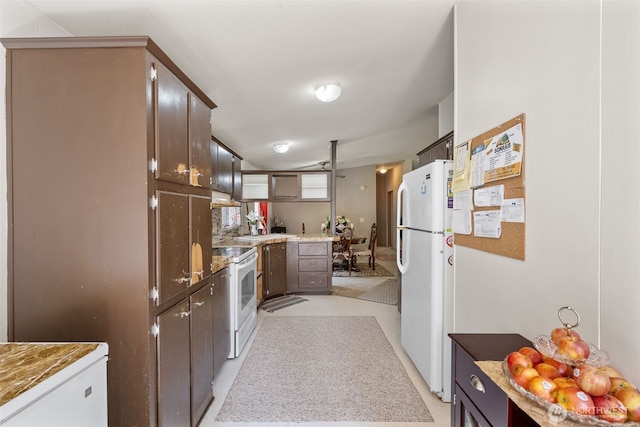 300 E Skookum Dr NE, Shelton, WA 98584 - kitchen with white appliances and dark brown cabinetry