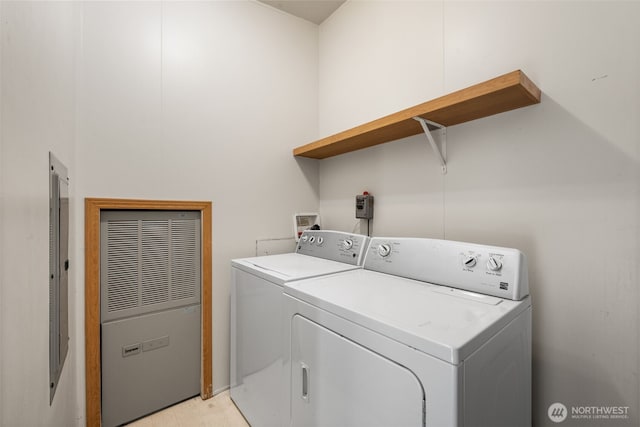 300 E Skookum Dr NE, Shelton, WA 98584 - laundry room featuring washing machine and dryer and a heating unit