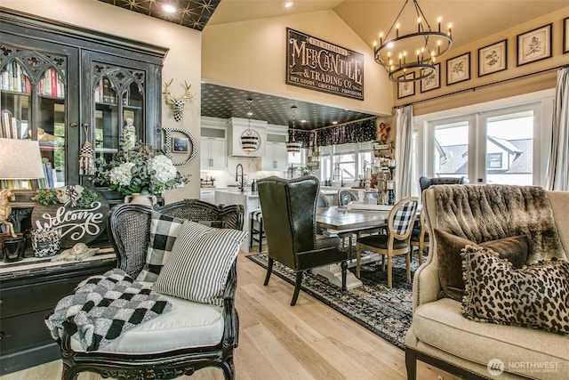 1774 Farmview Ter, Lynden, WA 98264 - dining space featuring a chandelier, high vaulted ceiling, and light wood finished floors