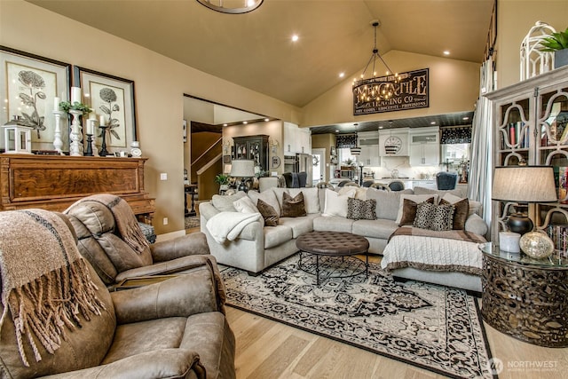1774 Farmview Ter, Lynden, WA 98264 - living area featuring wood finished floors, a chandelier, and high vaulted ceiling