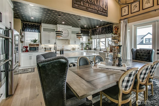1774 Farmview Ter, Lynden, WA 98264 - dining area featuring light wood-type flooring and healthy amount of natural light
