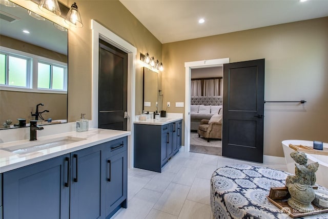 1774 Farmview Ter, Lynden, WA 98264 - bathroom featuring two vanities, ensuite bathroom, recessed lighting, and a soaking tub