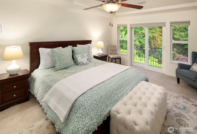 carpeted bedroom featuring a ceiling fan