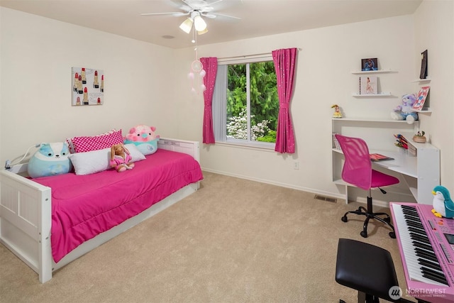 bedroom featuring carpet, baseboards, and a ceiling fan