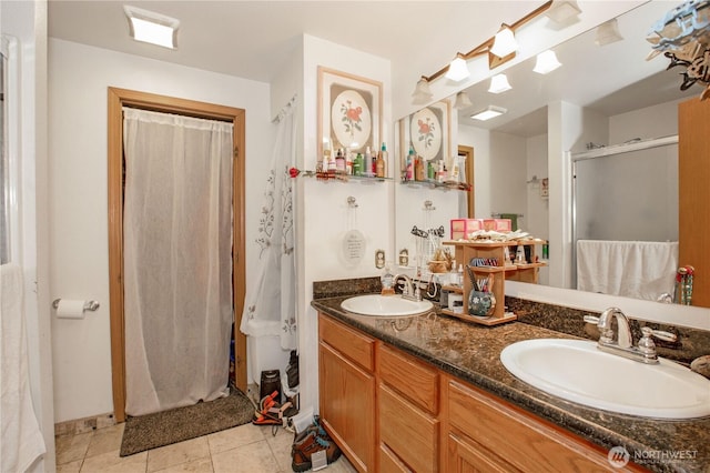 1431 Chatham Dr SE, Olympia, WA 98513 - full bathroom with a stall shower, double vanity, and tile patterned flooring