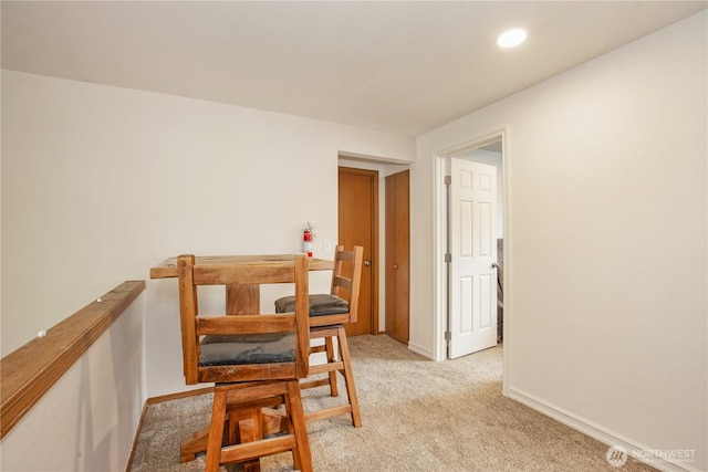 1431 Chatham Dr SE, Olympia, WA 98513 - dining space with light carpet, baseboards, and recessed lighting