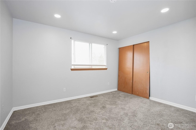 1431 Chatham Dr SE, Olympia, WA 98513 - unfurnished bedroom with carpet floors, a closet, recessed lighting, and baseboards