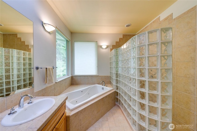 bathroom featuring a walk in shower, plenty of natural light, and a jetted tub