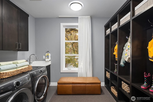 8326 84th Ave SE, Mercer Island, WA 98040 - laundry room with carpet, washer and dryer, cabinet space, and baseboards