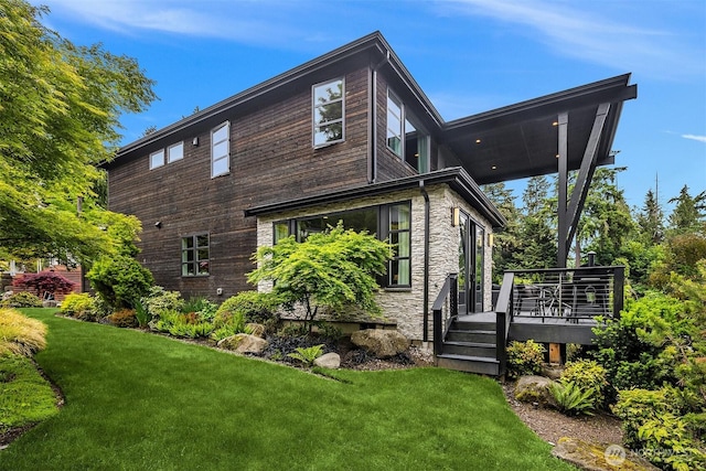 8326 84th Ave SE, Mercer Island, WA 98040 - rear view of property with a lawn and a deck