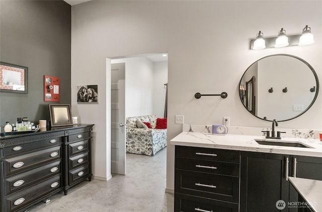 bathroom featuring concrete floors and vanity