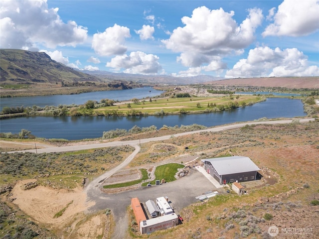 bird's eye view of a water and mountain view