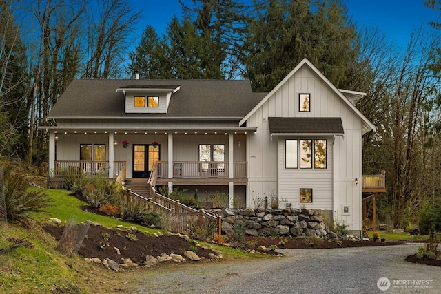 15403 127th Ave SE, Snohomish, WA 98290 - view of front of home with covered porch, stairway, french doors, and a shingled roof