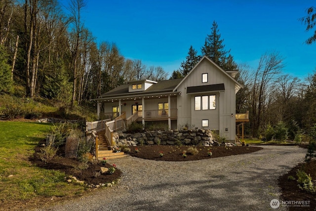 15403 127th Ave SE, Snohomish, WA 98290 - view of front of home featuring a porch, driveway, and stairway