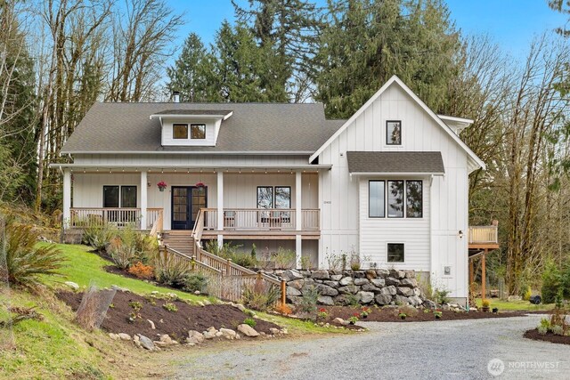 15403 127th Ave SE, Snohomish, WA 98290 - view of front of house featuring covered porch, stairway, and roof with shingles