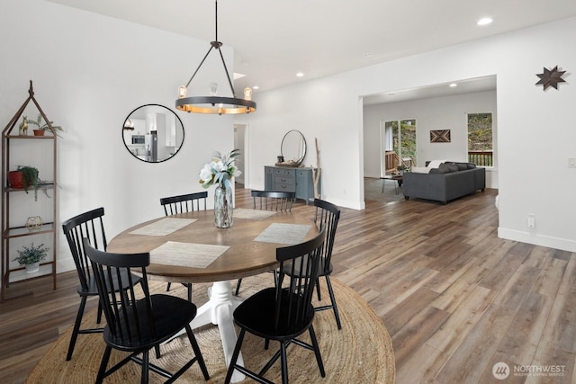 15403 127th Ave SE, Snohomish, WA 98290 - dining space with light wood-style flooring, recessed lighting, a chandelier, and baseboards