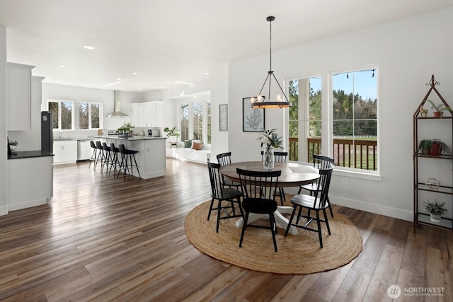 15403 127th Ave SE, Snohomish, WA 98290 - dining room with dark wood finished floors, recessed lighting, and baseboards