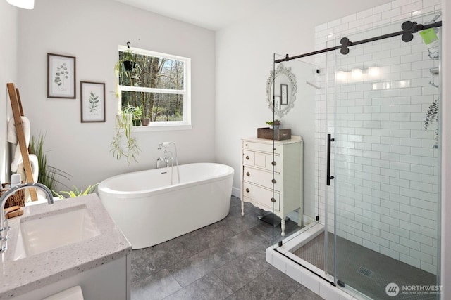 15403 127th Ave SE, Snohomish, WA 98290 - bathroom featuring a shower stall, a soaking tub, and vanity