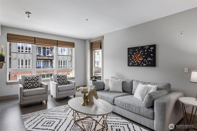 1840 25th Ave NE Unit 308, Issaquah, WA 98029 - living room featuring wood finished floors and baseboards