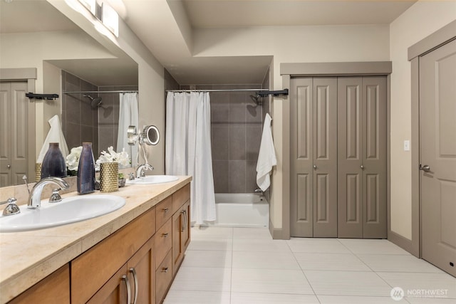 1840 25th Ave NE Unit 308, Issaquah, WA 98029 - bathroom featuring tile patterned floors, double vanity, a closet, and shower / bath combination with curtain