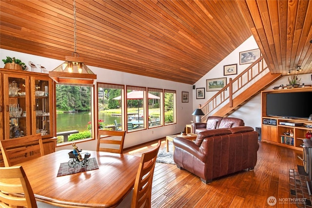 130 E Way To Tipperary St, Shelton, WA 98584 - dining area featuring vaulted ceiling, stairway, wood-type flooring, wooden ceiling, and a water view