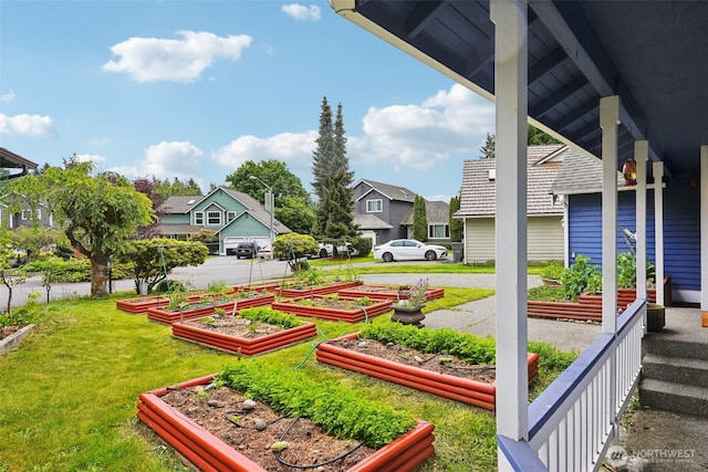 3008 S 365th Ct, Federal Way, WA 98003 - view of grassy yard with a vegetable garden and a residential view