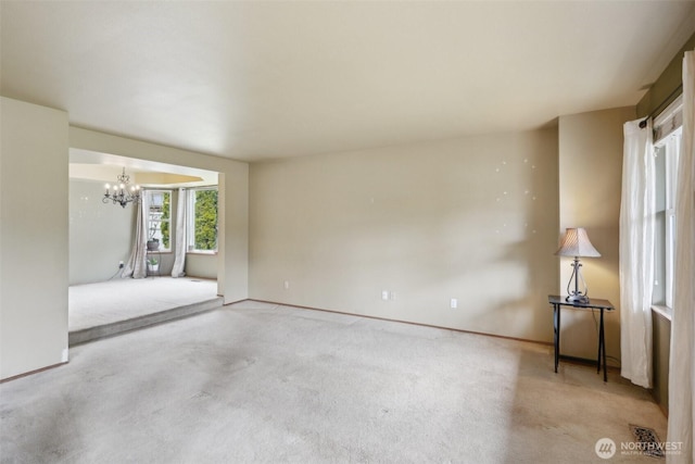 3008 S 365th Ct, Federal Way, WA 98003 - carpeted spare room featuring a chandelier and baseboards