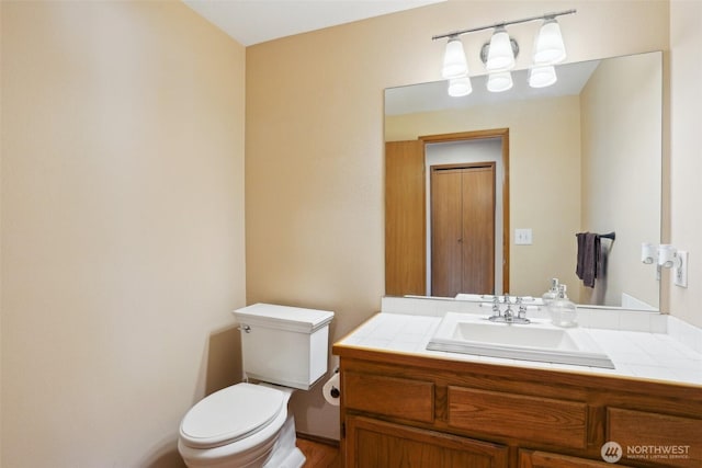 3008 S 365th Ct, Federal Way, WA 98003 - bathroom with toilet, vanity, and wood finished floors