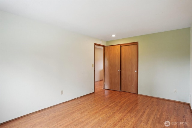 3008 S 365th Ct, Federal Way, WA 98003 - unfurnished bedroom featuring light wood-style floors, a closet, and recessed lighting